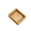 Bamboo soap dish on a white surface