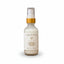 Spray bottle labeled 'Calm & Peace' on a brown background