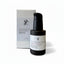 Collagen Boost vitamin C serum bottle and packaging on a textured surface with a neutral background