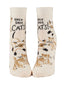 A pair of off-white crew socks featuring a playful print of orange tabby cats and the bold black text 'HOLY SHIT. CATS!'.